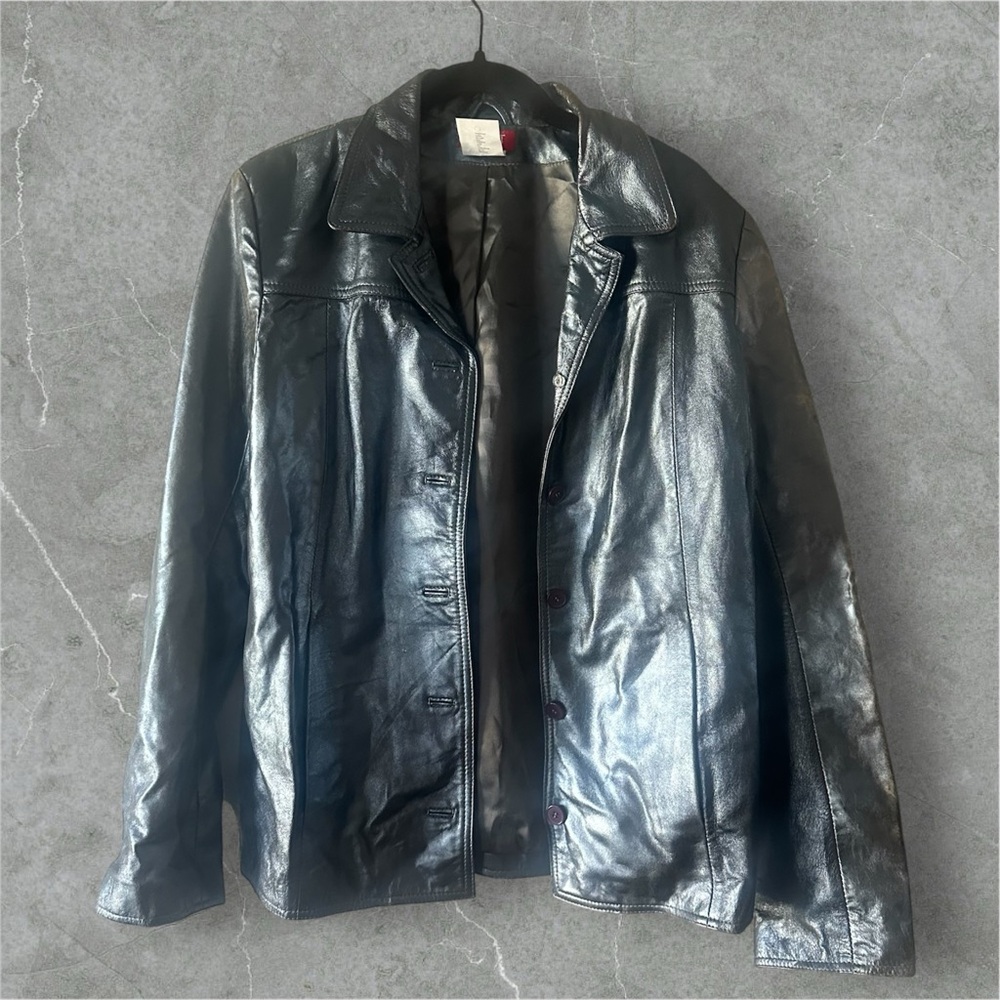 #leatherjacket 100% leather, weathering on arms- looks intentionally distressed